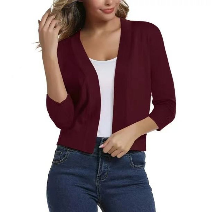 Dame åben kortærmet cardigan med 3/4 ærmer - Please provide the text you would like to have translated.